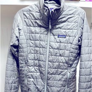 Patagonia goose down jacket.  Warm and light weight